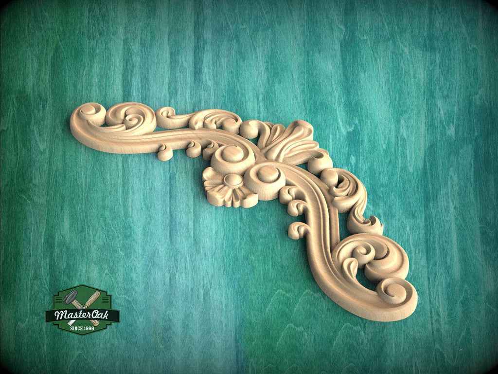 A decorative wooden carving with intricate swirls and curves is displayed against a teal background.