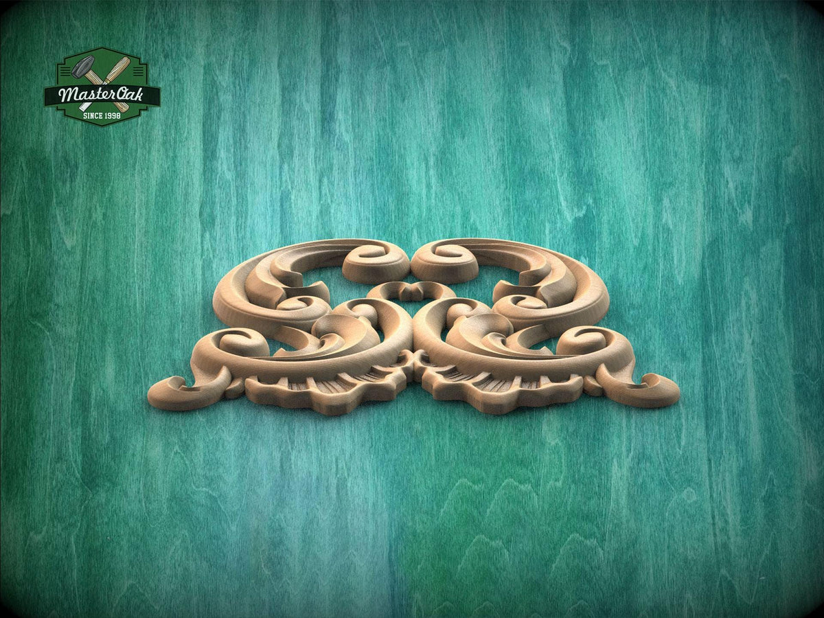 A decorative wooden carving with intricate scrollwork is displayed against a textured green background.