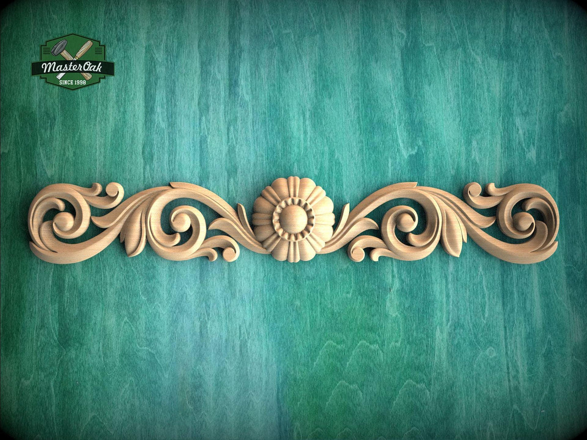 a wooden carving of a flower on a green background