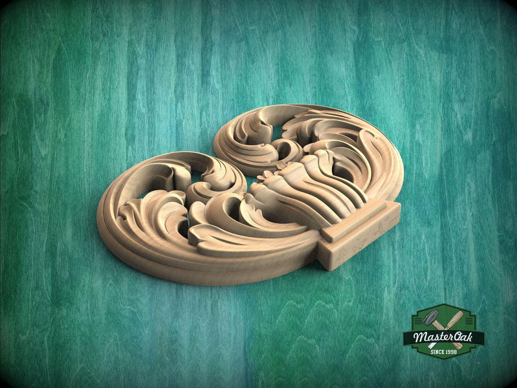 A wooden carving with intricate scrollwork sits on a green textured background.