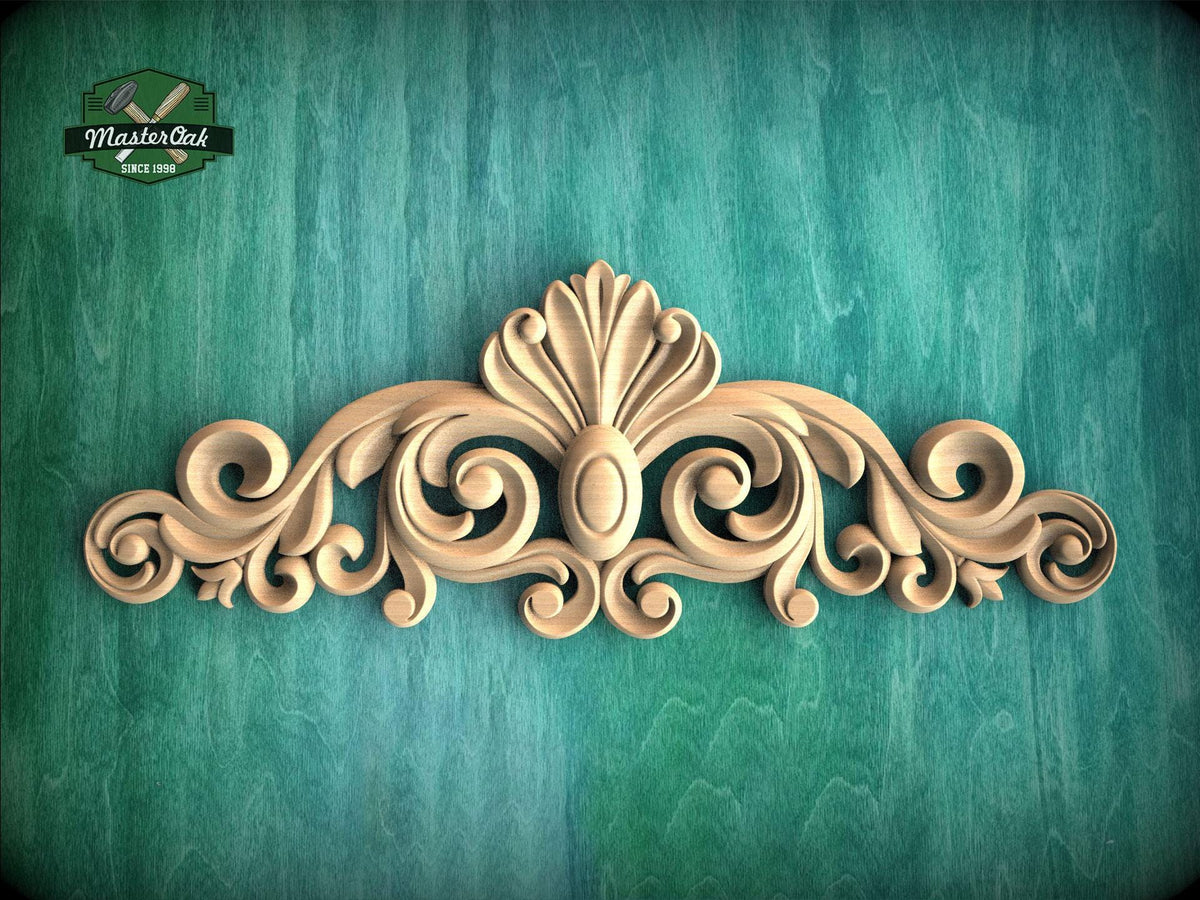 a decorative wooden carving on a green background.