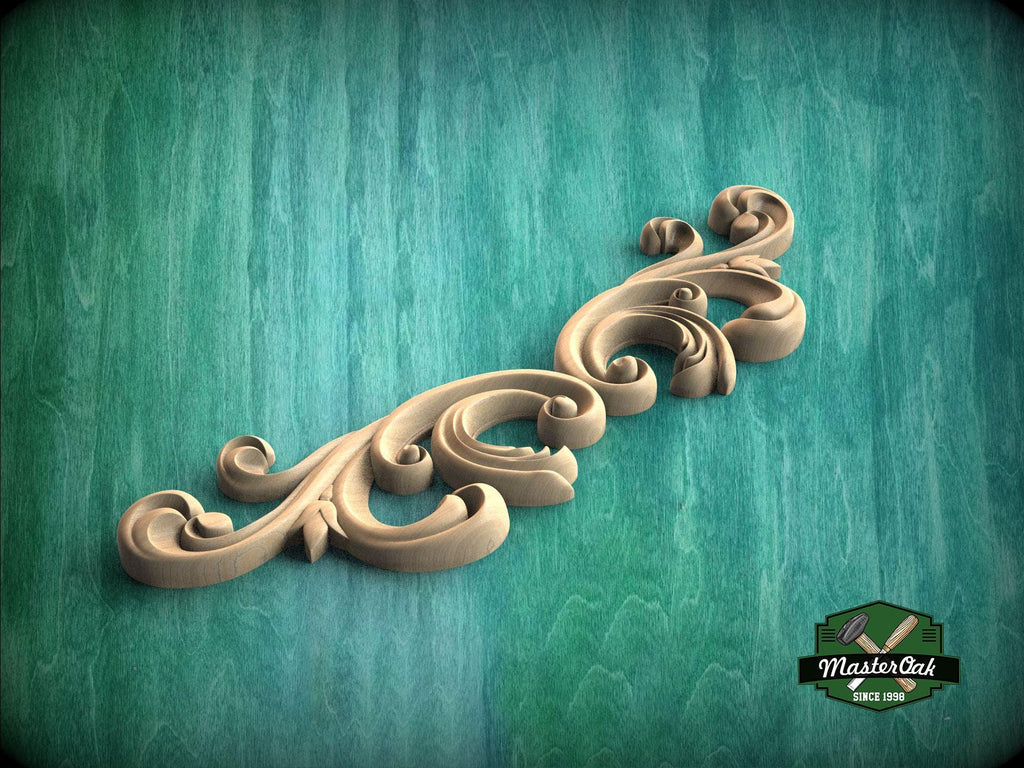 a wood carving of a scroll on a green background