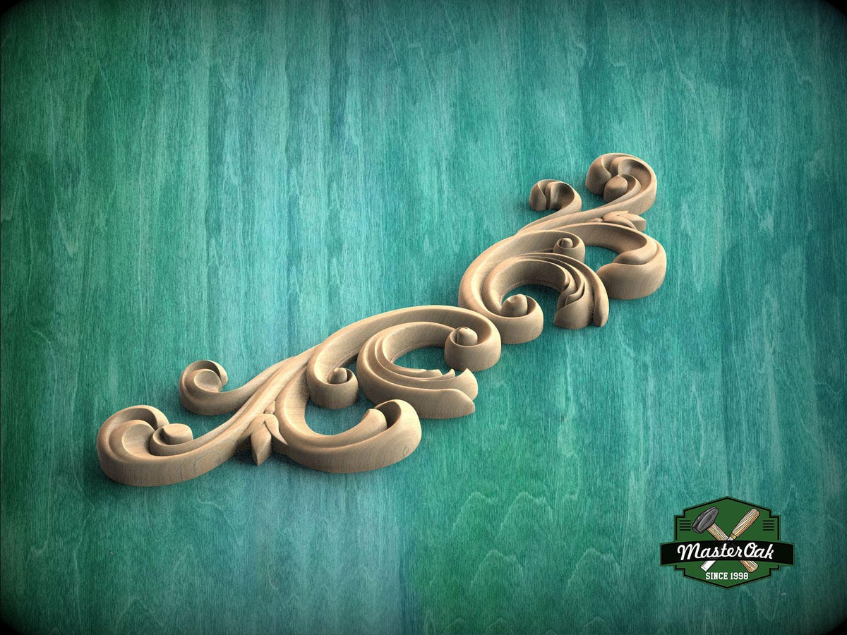 a wood carving of a scroll on a green background
