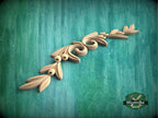 a close up of a wooden object on a green surface
