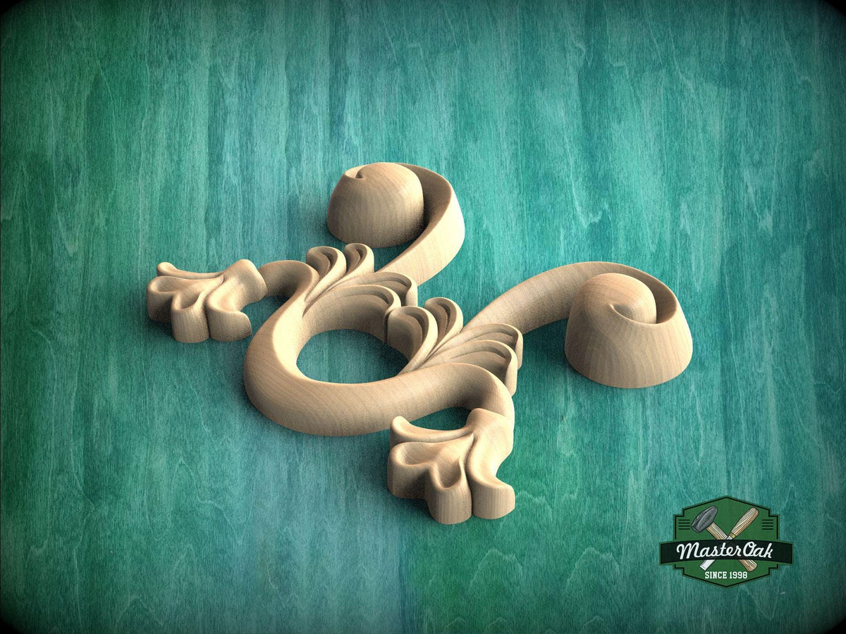 A wooden carving of a stylized flower or scroll design is displayed against a green background.