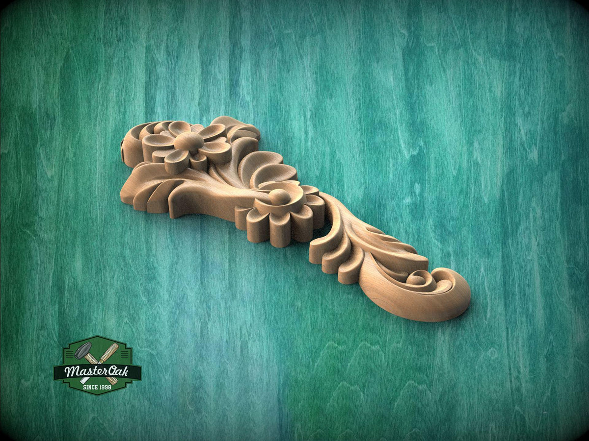 A wooden carving of a flower-like design is displayed against a green background.