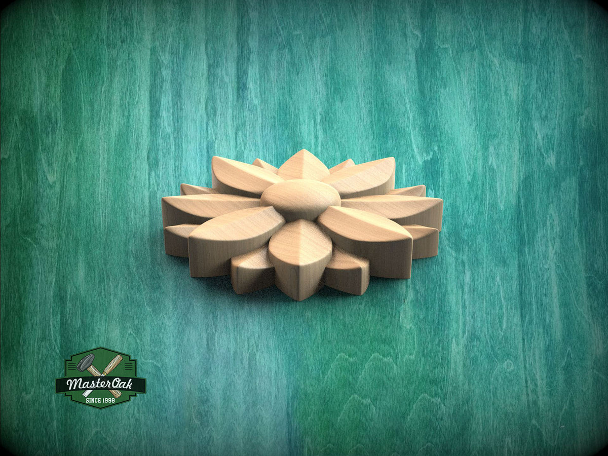 A wooden flower-shaped object is displayed against a green background.