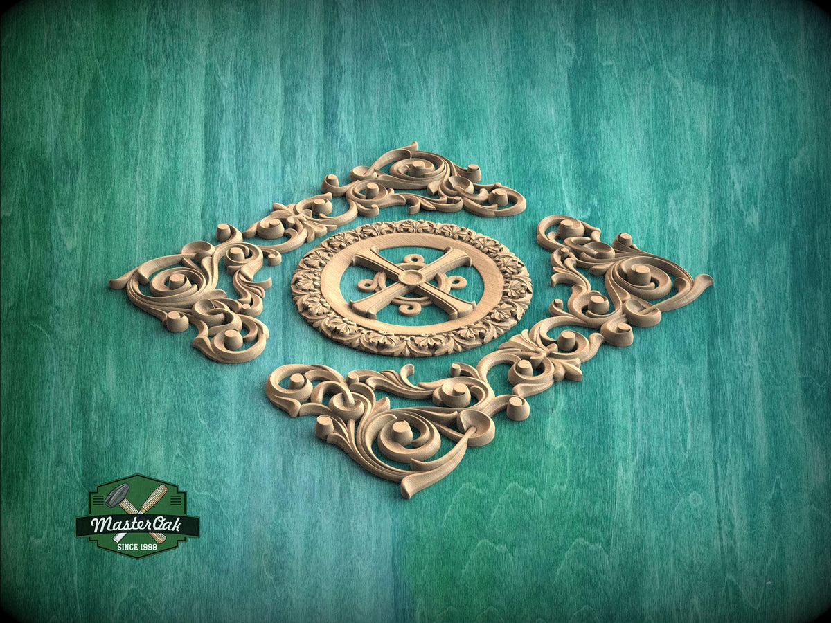 a decorative wooden carving with intricate scrollwork and a central motif, set against a green wooden background.