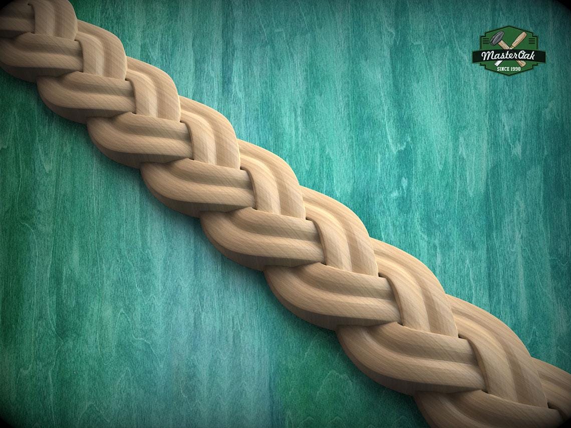 A close-up view of a braided wooden object, possibly a piece of furniture or a decorative item, set against a green wooden background.