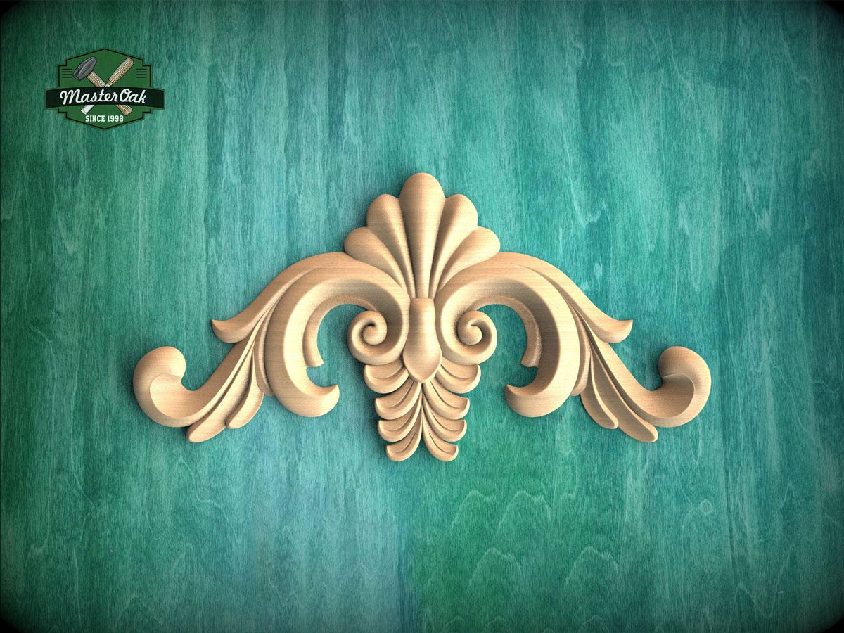 a wooden carving of a flower on a green background
