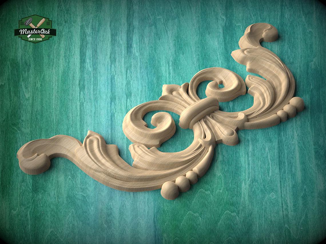 A decorative wooden carving with intricate scrollwork is displayed against a teal background.