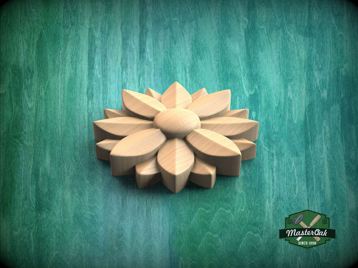 A wooden flower-shaped object is displayed against a green background.