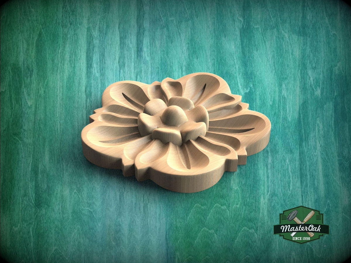 A wooden flower-shaped object is displayed against a green background.