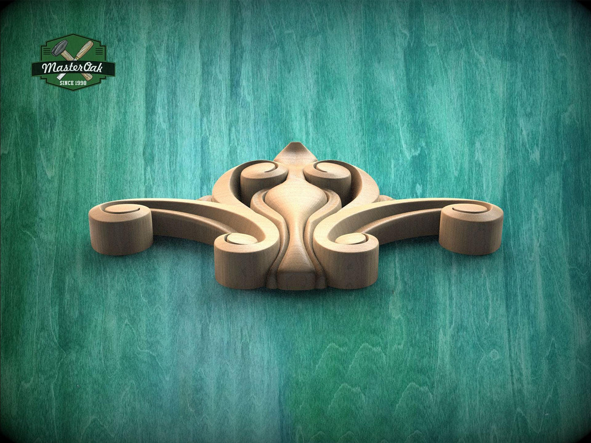 A wooden carving of an octopus or squid with curled tentacles is displayed against a green background.