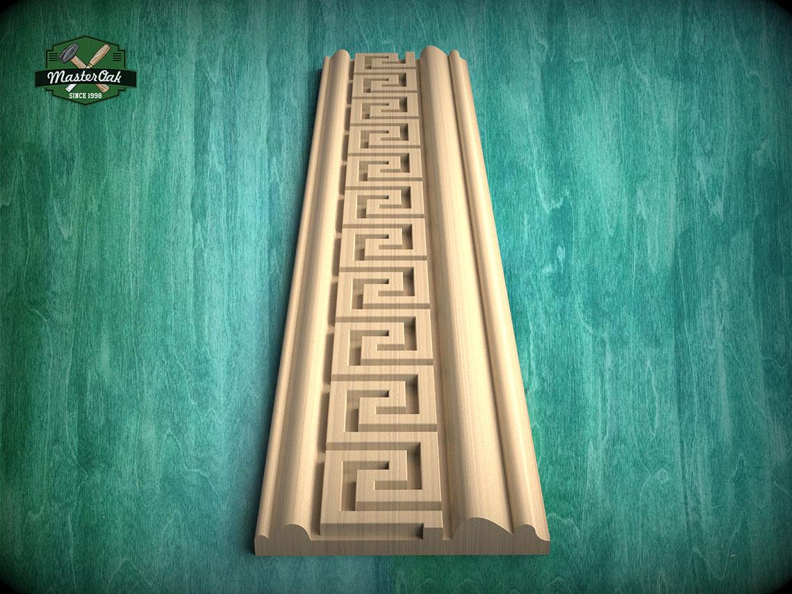 a wooden carving with a repeating geometric pattern, displayed against a green background.
