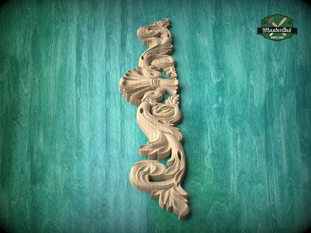 A decorative wooden carving in the shape of a bird is displayed against a green textured background.