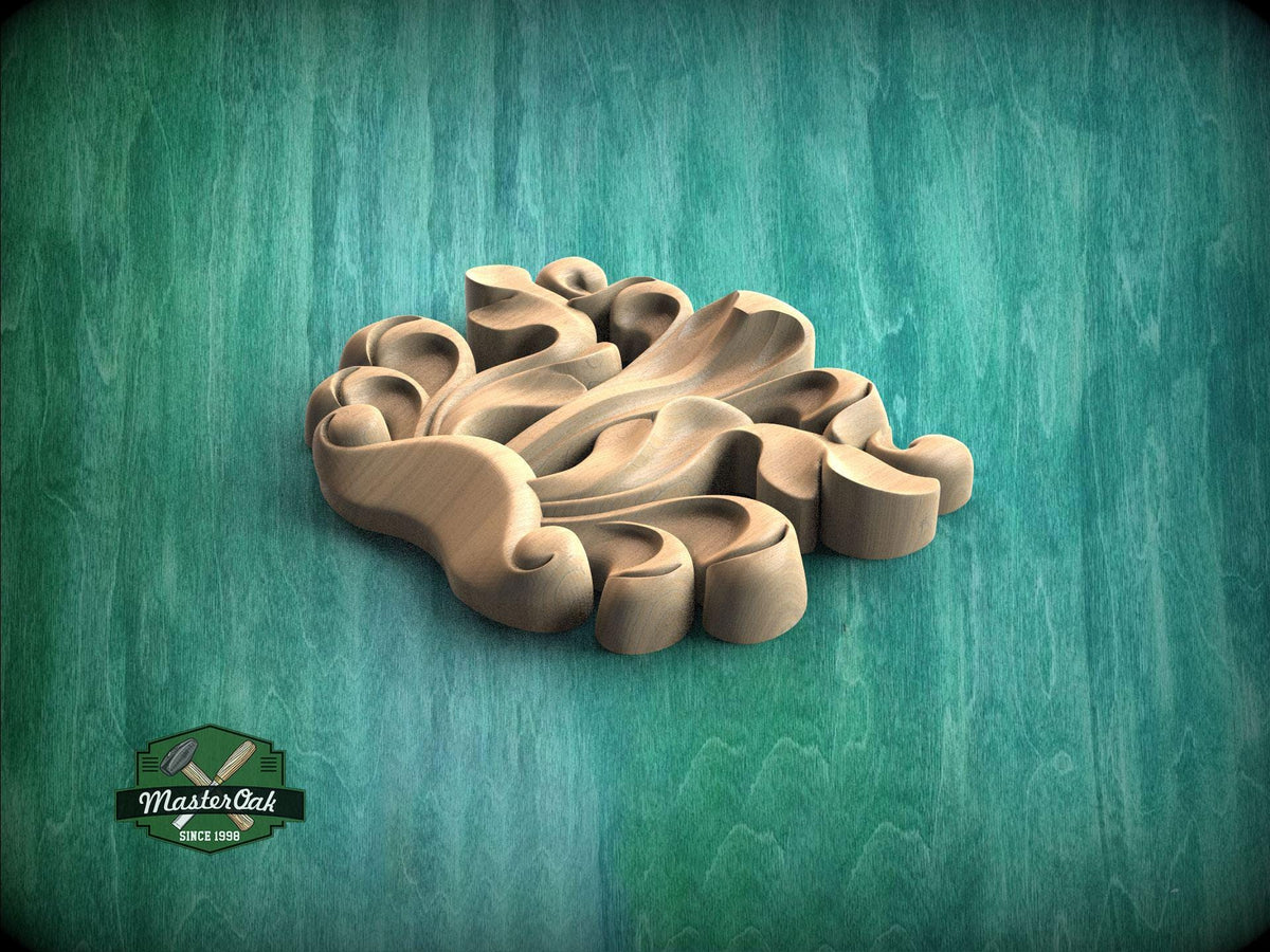 A wooden carving with intricate, organic shapes sits on a green background.