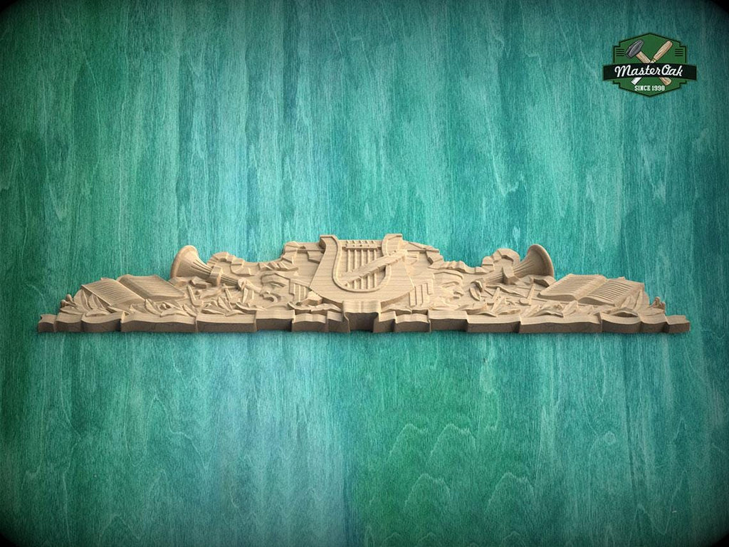 A wooden carving of a harp and other musical instruments is displayed against a green background.