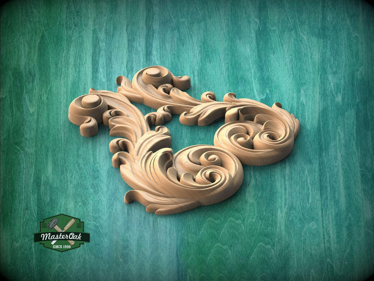 A decorative wooden carving in the shape of a stylized flower or leaf, with intricate swirls and curves, is displayed against a green background.