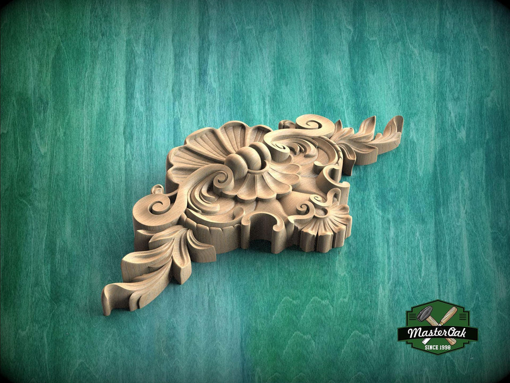 A carved wooden ornament with intricate floral and leaf designs is displayed against a green background.