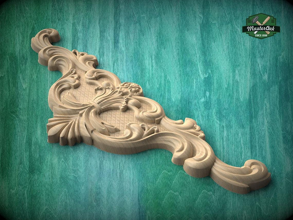 A decorative wooden carving with intricate floral and scrollwork designs is displayed against a green background.