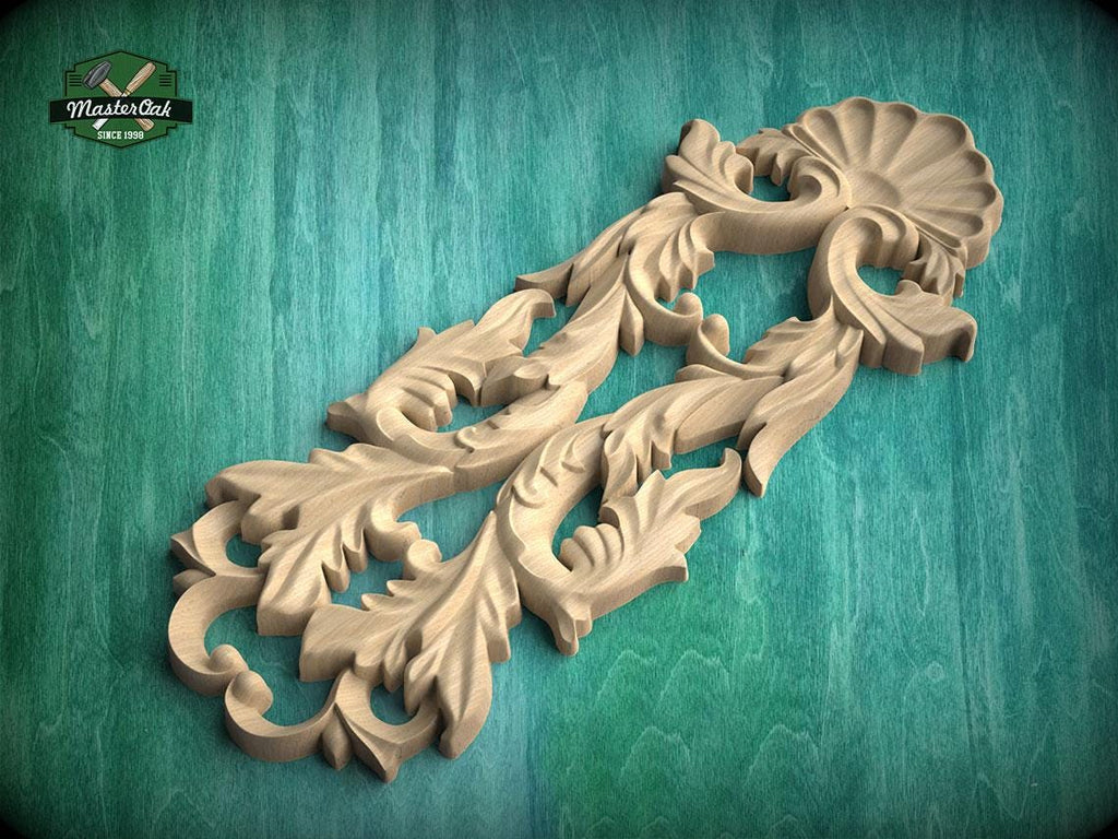 A wooden carving with intricate floral and leaf-like designs is displayed against a green background.