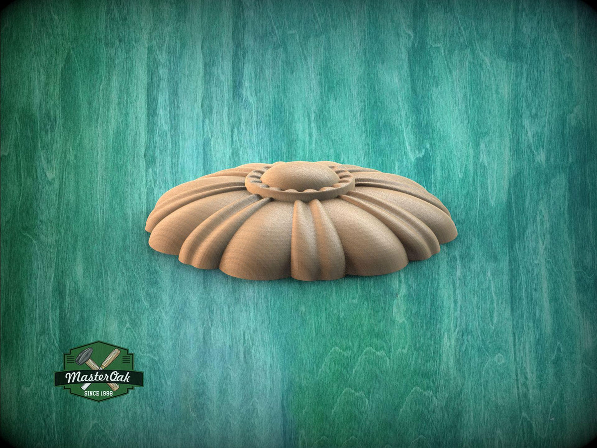 A wooden ornamental piece, possibly a decorative finial or mold, is displayed against a green textured background.