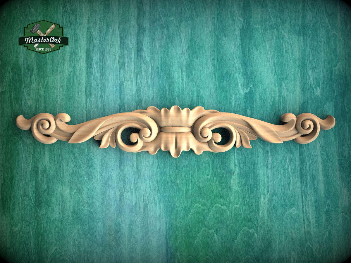 a wood carving on a green wall