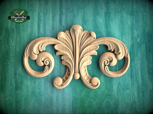 a decorative wooden carving on a green background.