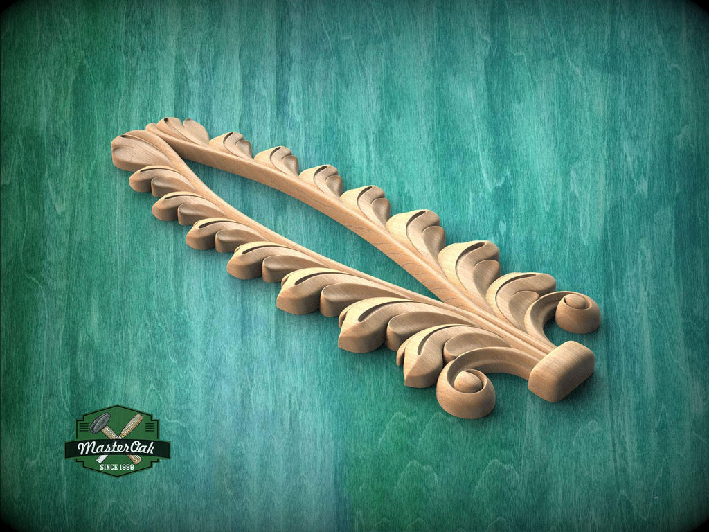 A wooden decorative piece with a leaf-like design is displayed against a green background.