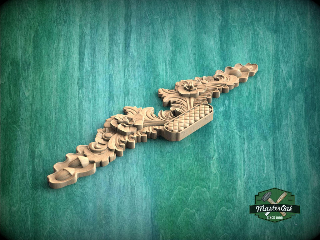 a wooden carving of a dragon on a green background