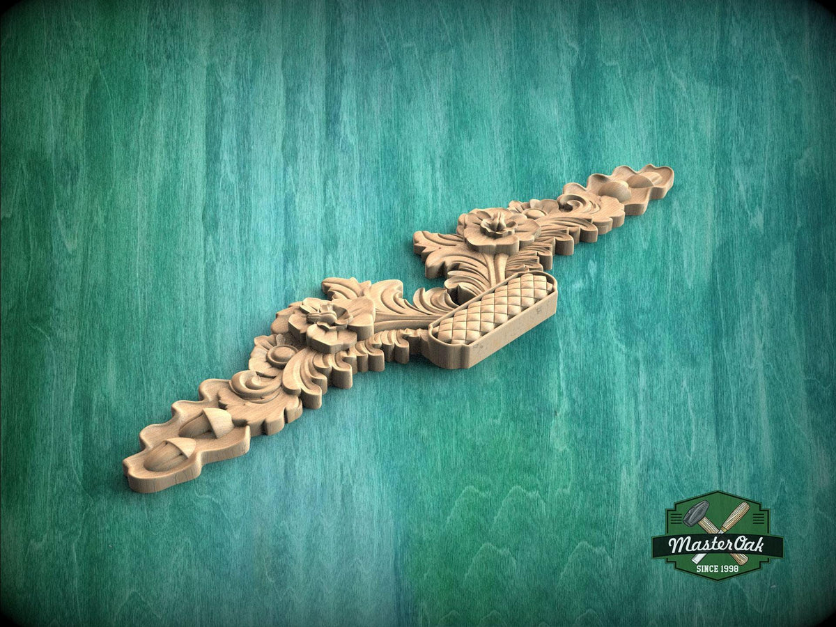a wooden carving of a dragon on a green background