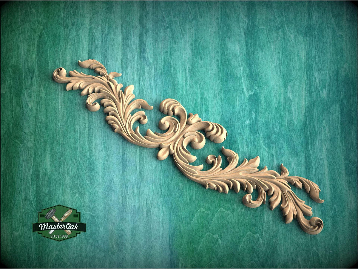 a wood carving of an ornate design on a green background