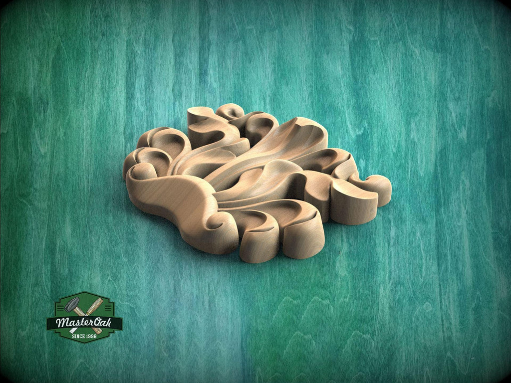 A wooden carving with intricate, organic shapes sits on a green background.