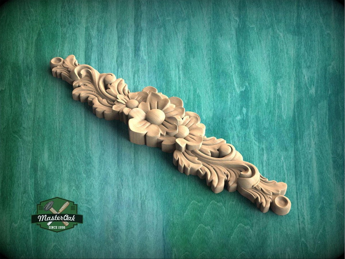 a wood carving of a flower on a green background