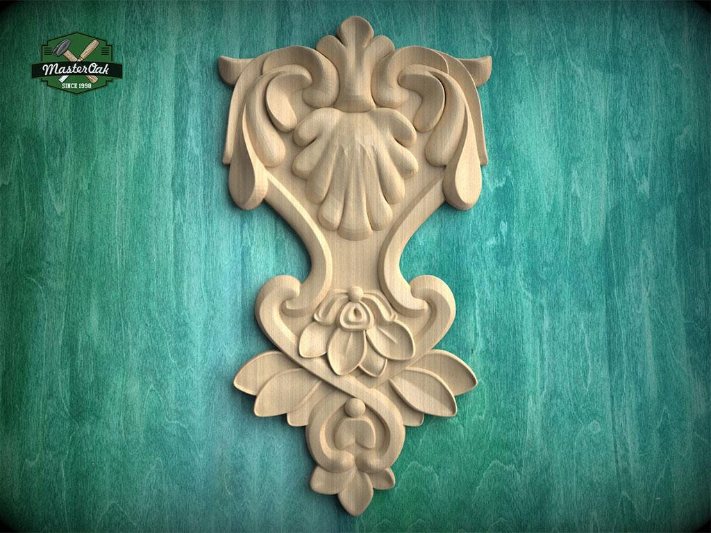 a decorative wooden carving on a green background.