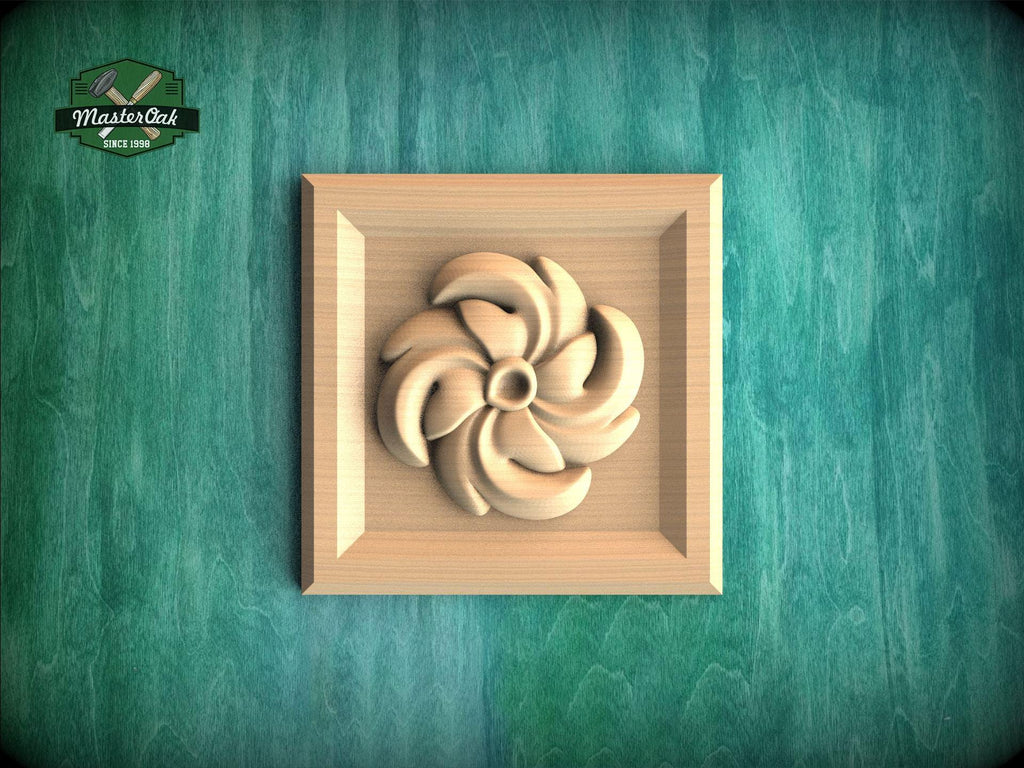 A wooden relief in the shape of a flower is displayed against a green textured background.