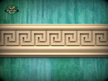 Load image into Gallery viewer, a decorative wooden border with a repeating Greek key pattern, set against a green textured background.
