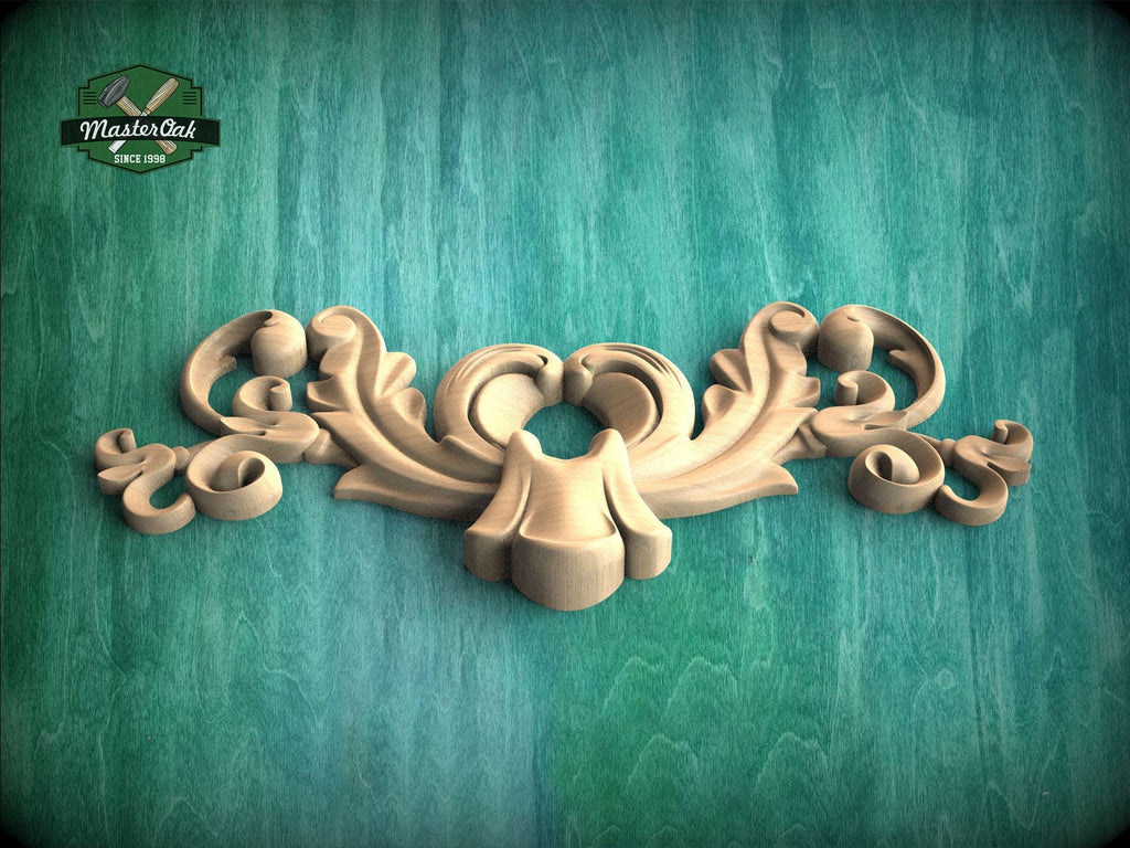 A decorative wooden carving with intricate scrollwork is displayed against a green textured background.