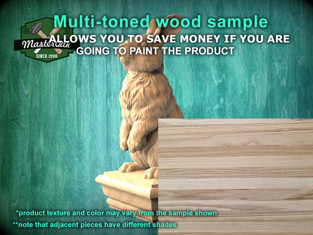 a wooden statue of a cat sitting on top of a wooden box