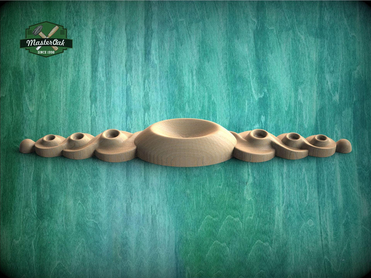 a group of wooden objects sitting on top of a green surface