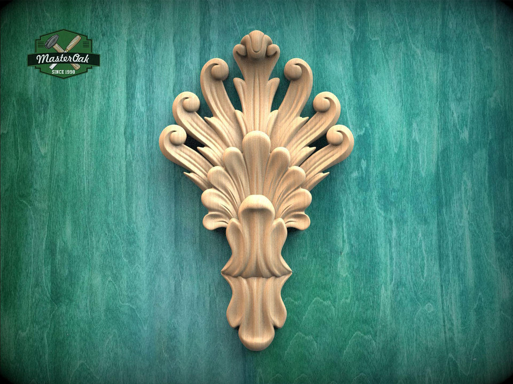 a decorative wooden carving on a green background.