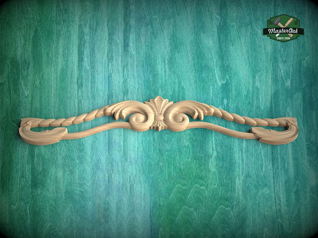A decorative wooden carving with intricate scrollwork is displayed against a green textured background.