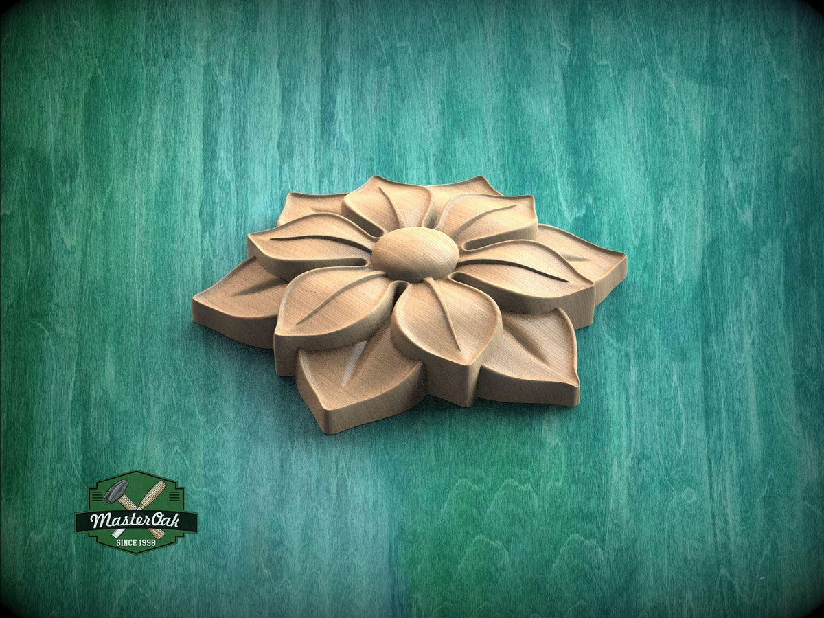 A wooden flower-shaped object is displayed against a green background.