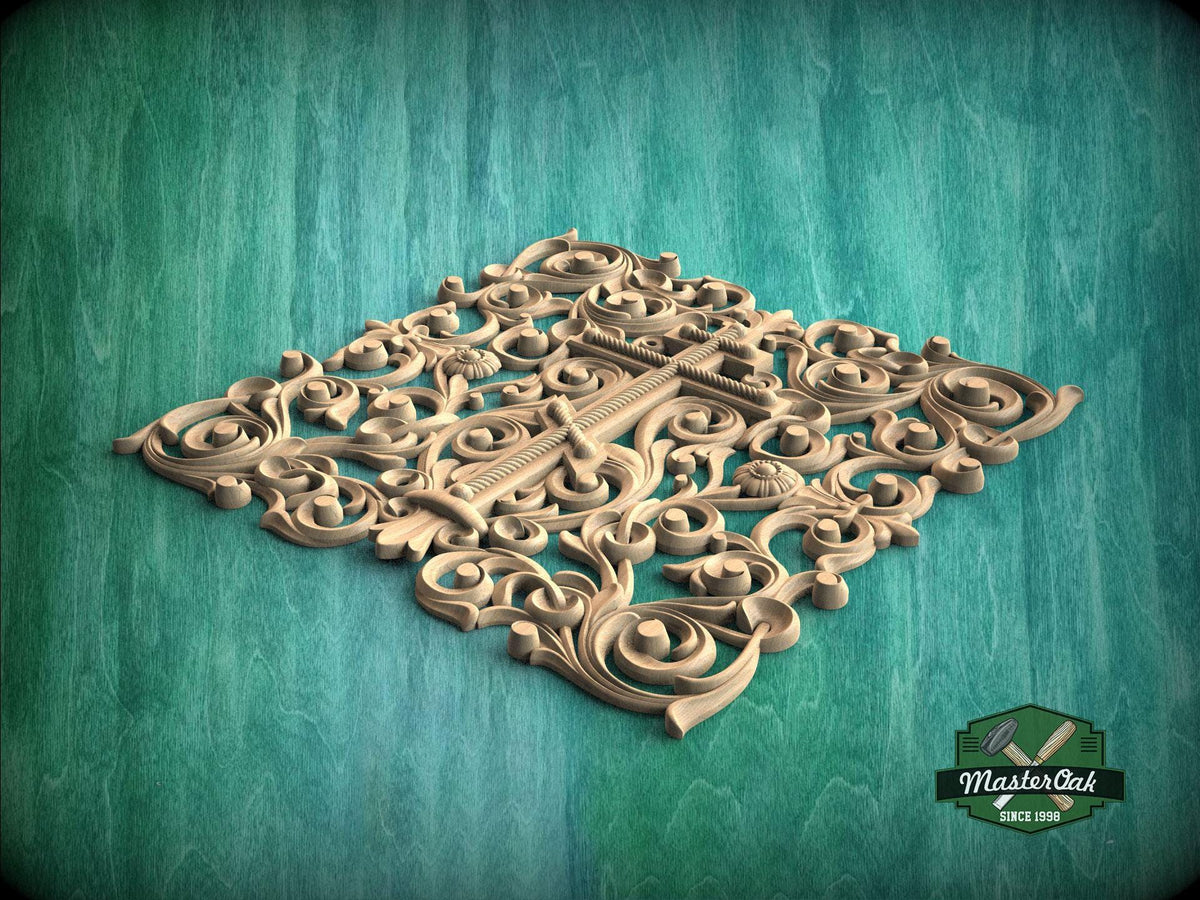 an intricate, ornate wooden carving with a floral design, set against a green background.