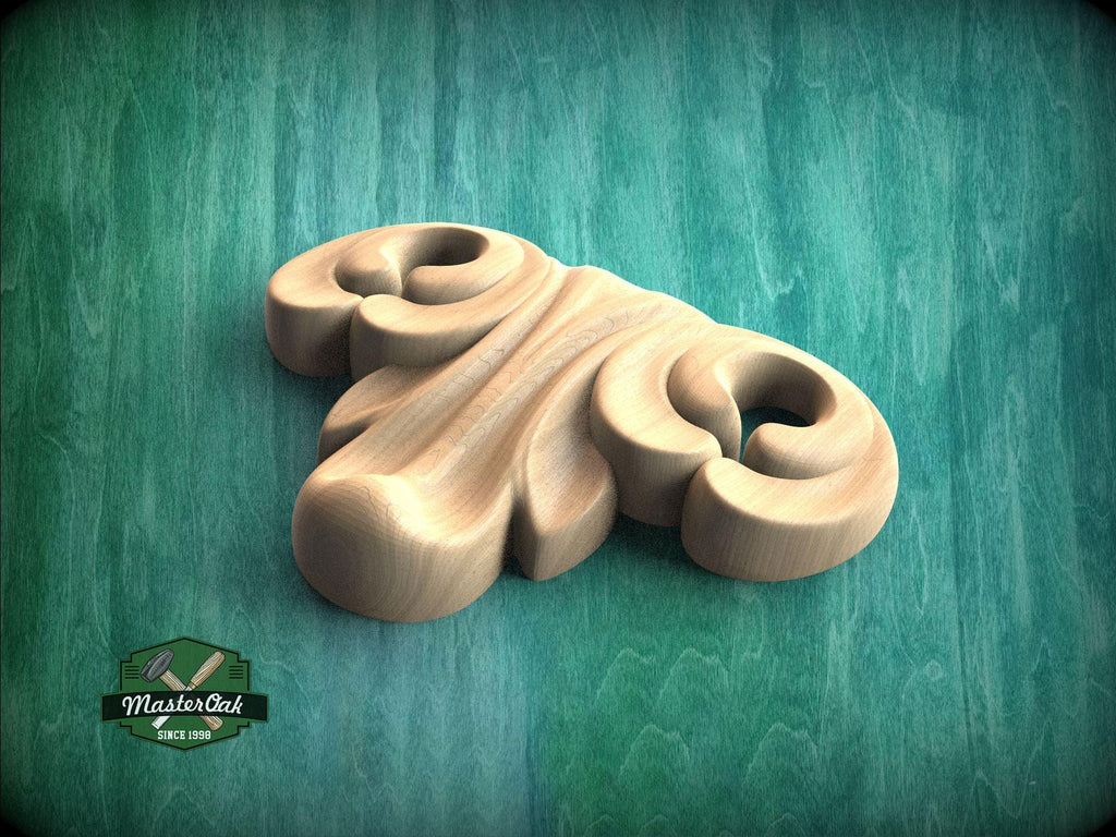 A wooden carving with a curved, organic shape is displayed against a green background.