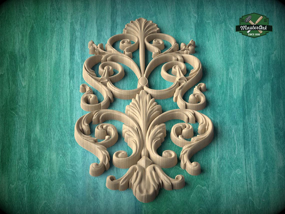 an ornate, carved wooden design with intricate scrollwork and floral elements, set against a teal background.