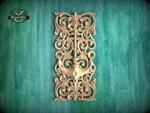 Load image into Gallery viewer, an ornate, carved wooden panel with an intricate design, including a cross and floral patterns, set against a green background.

