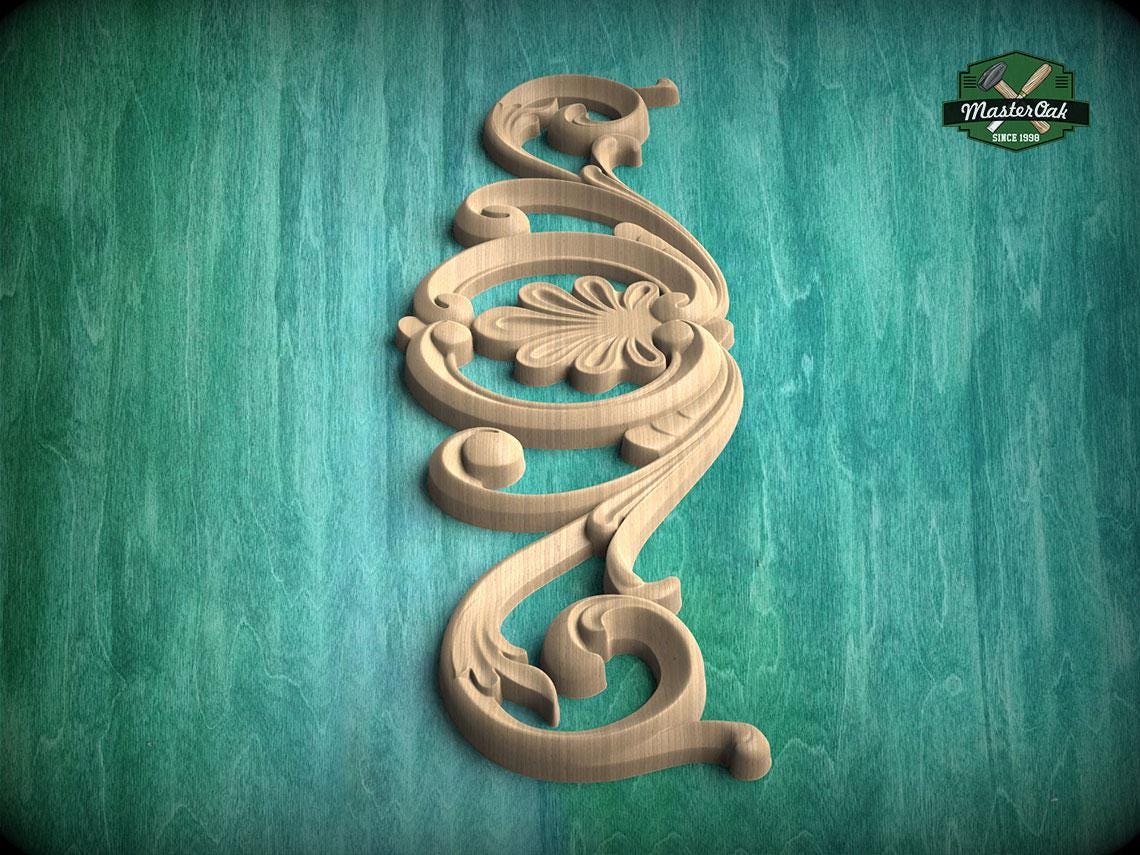 A decorative wooden carving with an intricate floral design is displayed against a teal-colored background.