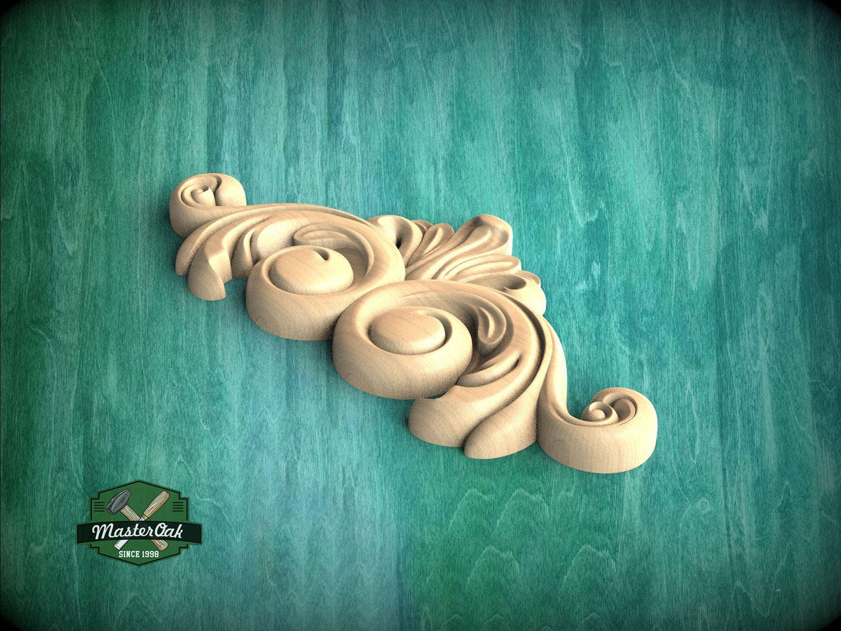 A decorative wooden carving in the shape of a swirl or scroll is displayed against a green background.